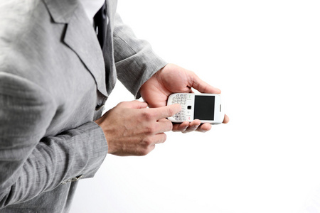 顶视图的 businesman 双手捧出一部智能手机照片