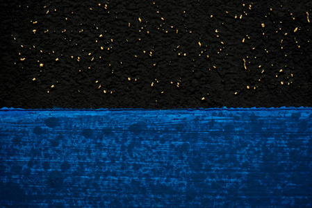 深蓝色和黑色背景用刷子涂抹.星光灿烂的天空和蔚蓝的大海照片