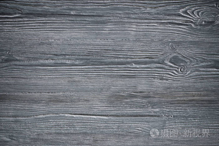 灰色木板与风化的裂缝线.自然背景的破旧别致的设计.灰色木地板形象.