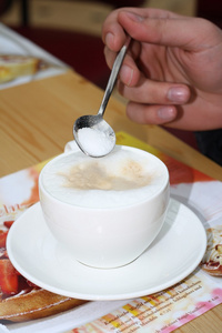 咖啡加糖特写图片