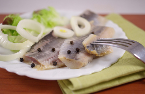 盐渍的鲱鱼照片