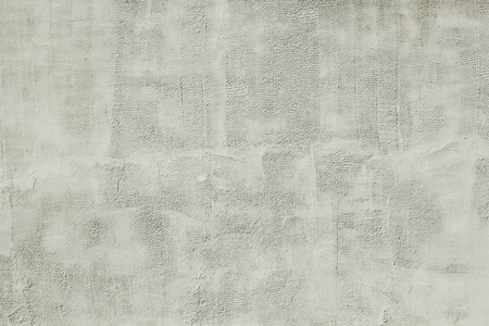 白色混凝土表面具有抽象斑点, 质地无缝。背景