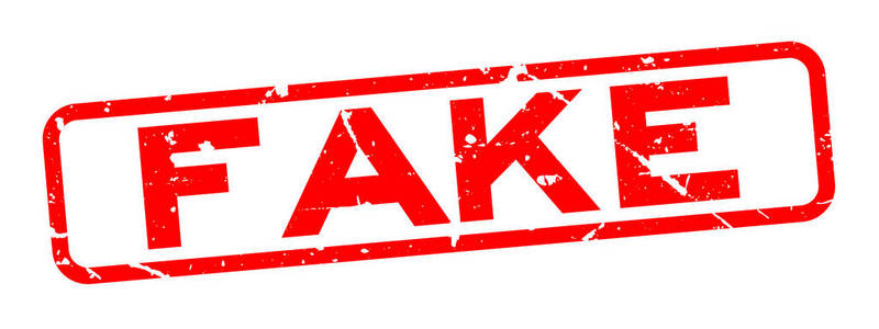 白色背景上的红色假字方形橡皮印章邮票照片