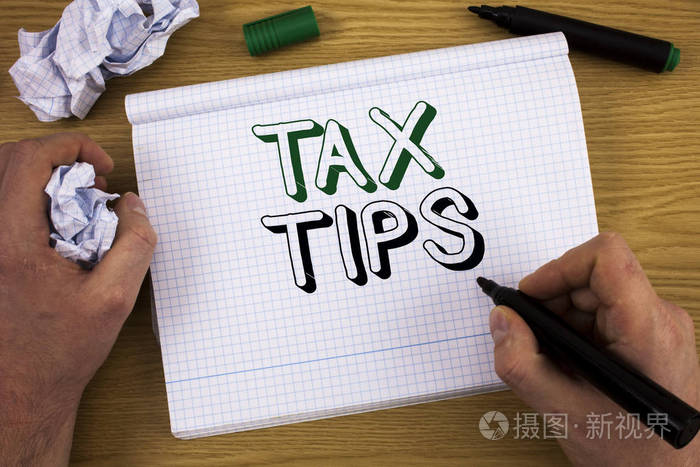 手写文字税提示。概念意义帮助税收增加收入减少费用概念信息
