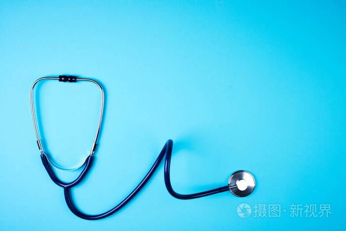 在蓝色背景听诊器.医学背景.医生设备.医学,体检,保健理念