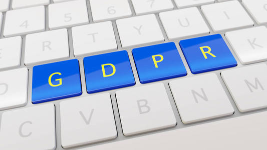 带蓝色和黄色 Gdpr 键的白色键盘