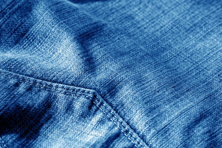 牛仔裤与口袋与模糊效果在海军蓝颜色