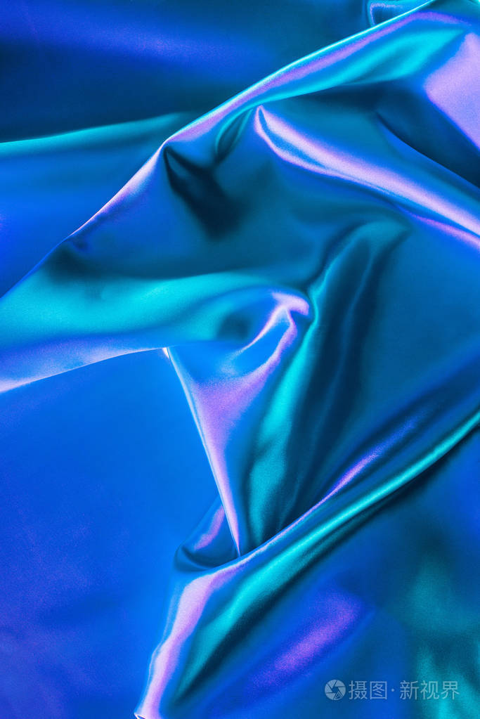 蓝色和绿松石光泽丝绸面料背景