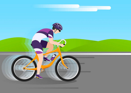 一辆橙色自行车上戴着头盔的自行车在乡间小路上行驶得很快。