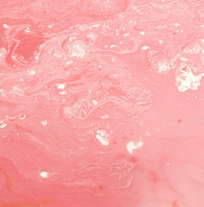 抽象大理石柔和的珊瑚粉红色的颜色油漆背景。大理石花纹亚克力质感