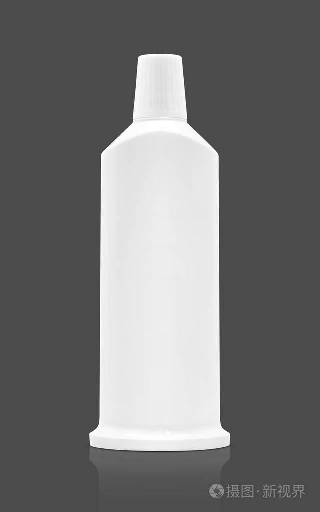 空白包装塑料牙膏管在灰色背景下分离