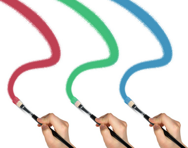 手用五彩的画笔图片