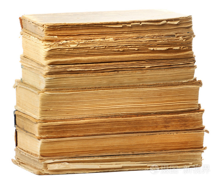 不同的形状和颜色的旧图书在白色的表现力上孤立