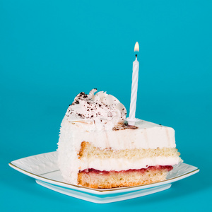 一根蜡烛一块用一根蜡烛的生日蛋糕照片