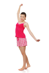 粉红色睡衣的年轻少女女人图片