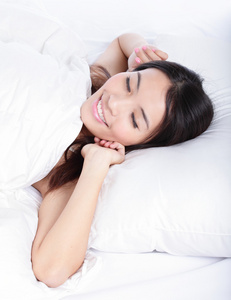 本书,睡着了的女孩的画像女生笑着睡着的同学坐在床上伤心的年轻女子