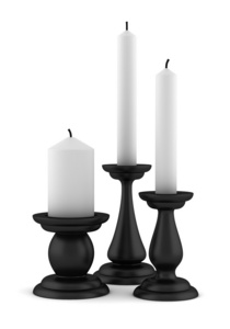 三个黑烛台孤立在白色背景上的蜡烛