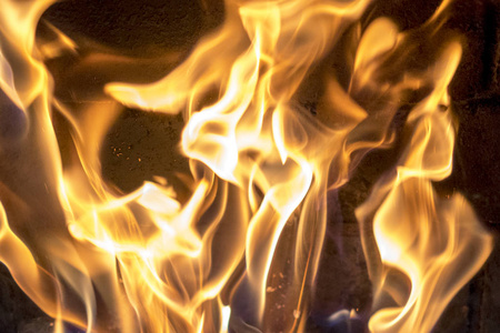 红黄火在壁炉特写。火焰.火灾背景