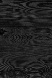 烂木板老风化腐烂破获打结黑色染色和漆松木木板片的纹理细节照片