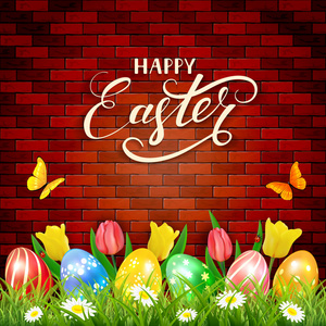 复活节彩蛋和郁金香砖墙背景