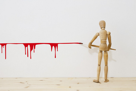 人体模特写一条红线用刷子照片