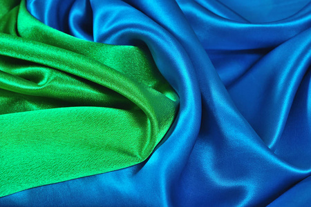 天然蓝绿缎布为背景