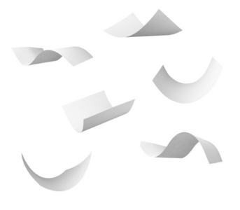 空白卷纸在风中飞照片