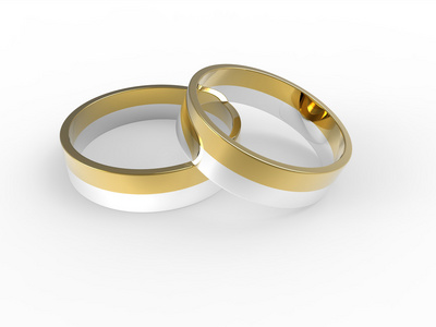 黄金和白银被隔绝在白色背景上的结婚戒指