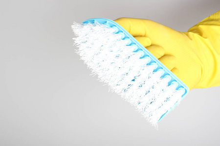黄色手套刷蓝色清洁清洁
