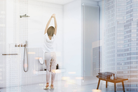 妇女在白色瓷砖浴室内饰与白色瓷砖地板, 和淋浴。一个温馨的家的概念。3d 渲染模拟色调图像双曝光