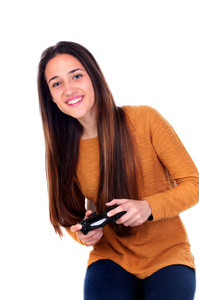 十几岁的女孩玩一个游戏杆孤立的白色背景