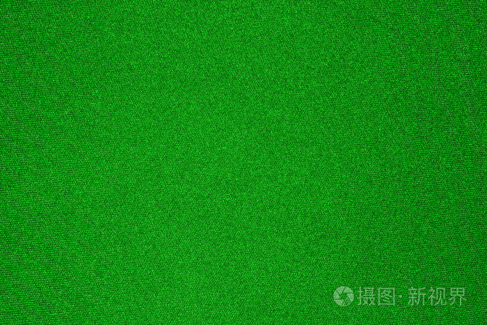 面料绿色鲜艳的质感.绿色光亮面料背景