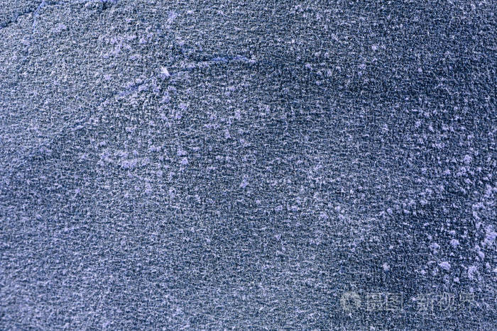 深蓝色砂纸纹理粗砂磨料的背景使用的谷物金刚砂背景