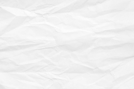 揉皱纸条背景是白色的, 有一个旧的表面, 有裂缝和纠结.