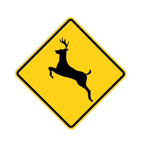 道路标志穿越的鹿