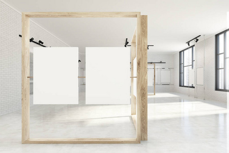 白色墙壁海报画廊与大窗口, 白色地板和二个垂直的模型海报垂悬在木框架。3d 渲染