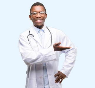 年轻的黑人医生, 医学专业持有的东西在空的手