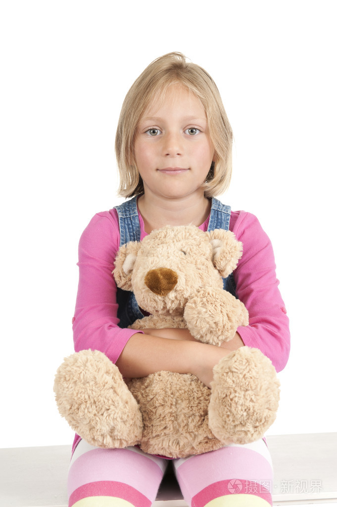 在白色的泰迪熊的女孩