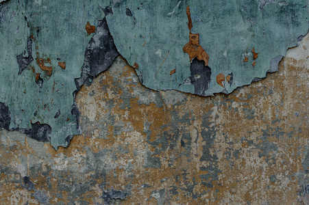 长时间前的背景纹理涂在蓝色染料开裂的水泥墙上