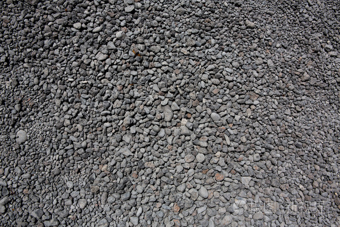 黑灰色火山熔岩滚动的石头纹理