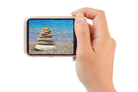 相机与海滩图片在手图片