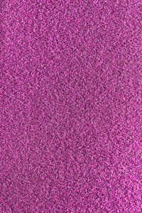 粉红色蓬松材料质地。光玫瑰详细纤维蓬松的表面背景