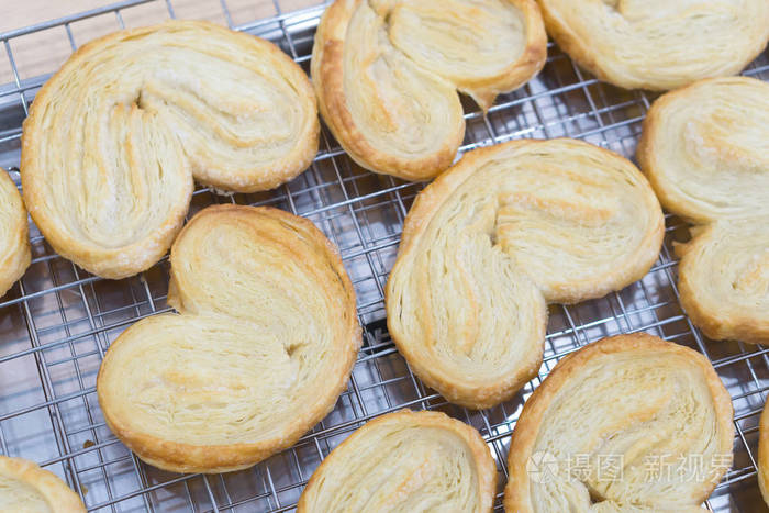 特写蝴蝶馅饼或 palmier 饼干, 甜和甜点概念