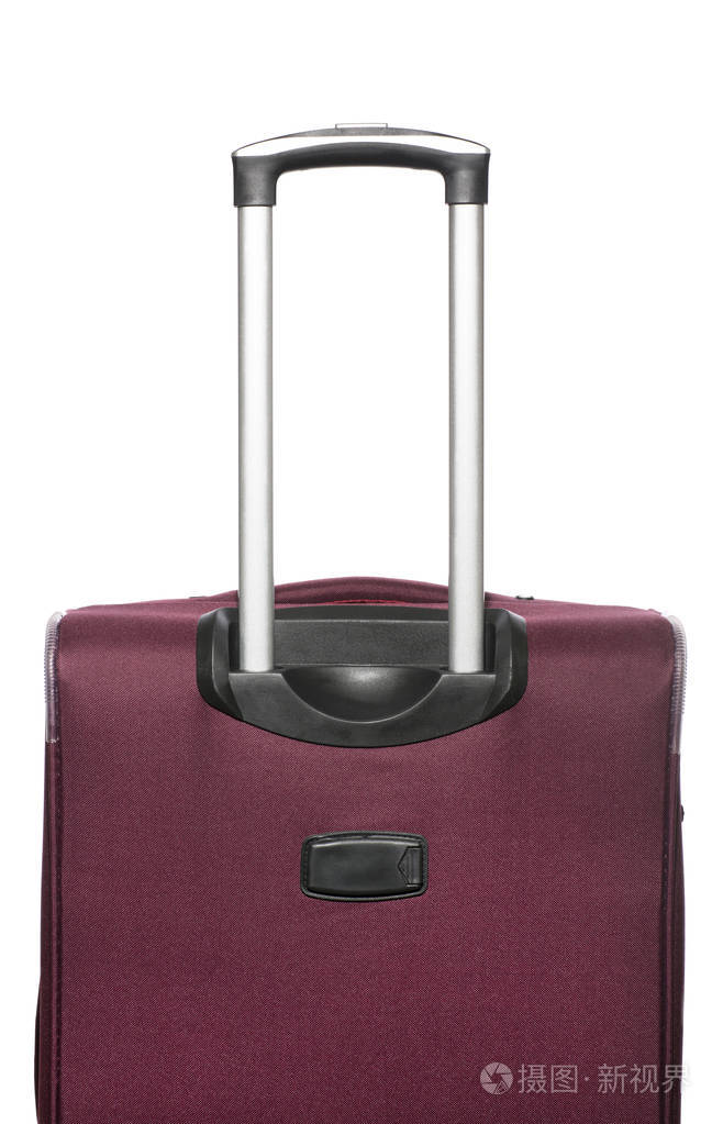 带拉出手柄的旅行手提箱在白色背景下