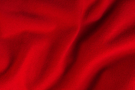 从红色羊绒布的质地的抽象背景