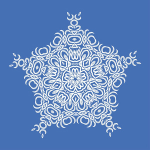 装饰白色五蓝色背景上的白色五侧面雪花装饰品照片