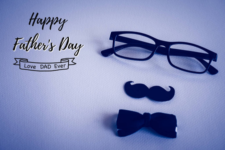 快乐的父亲日概念。深色白色背景上的眼镜胡须和领结