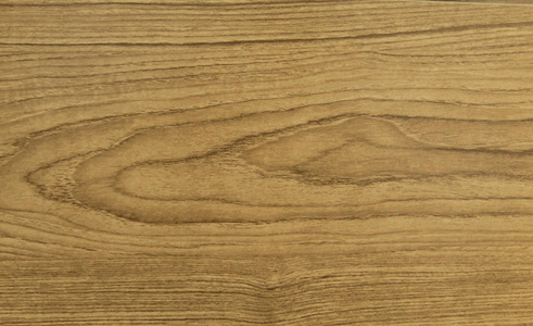 浅褐色软木纹理表面为背景.