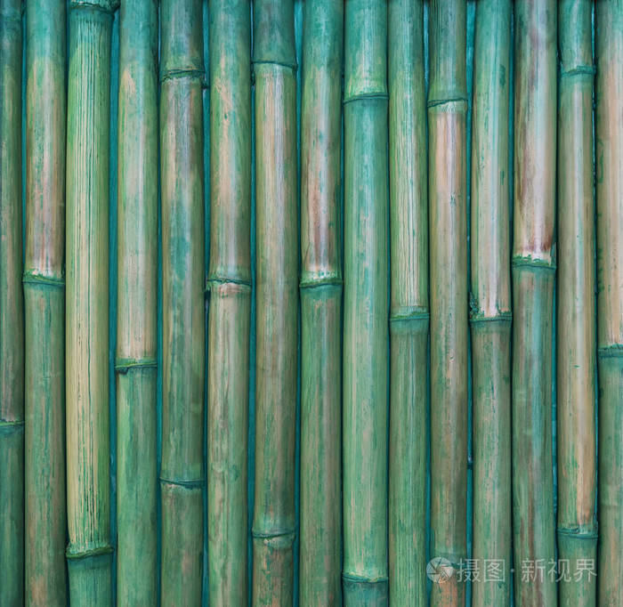 抽象背景从竹子图案墙壁与绿色绘。复古和复古。用于添加文本消息的图片。设计艺术作品背景