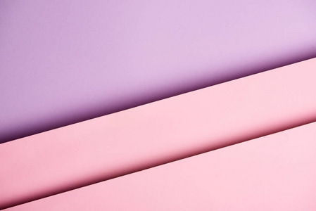 紫色和粉红色色调重叠纸的图案